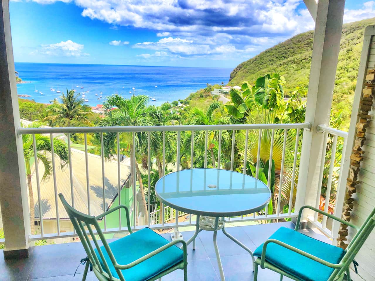 A balcony overlooking the Caribbean. Tillet apartment. O Coeur de Deshaies residence.