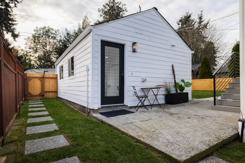 detached unit w/ outdoor seating for two to enjoy a meal or morning coffee