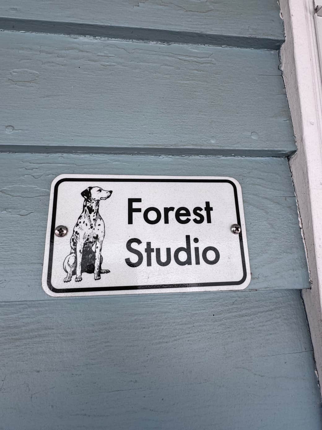 Sign showing the Forest Studio: our studios are pet friendly.