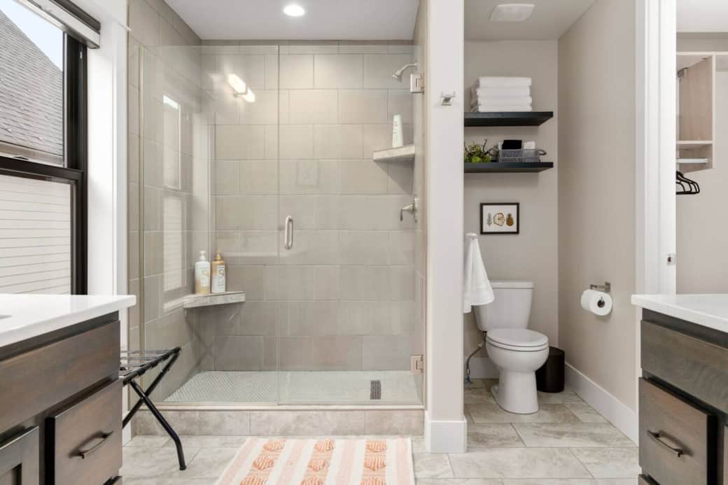 Attached bathroom with 2 sinks and a walk-in closet (from the second suite). Attached bathroom with 2 sinks and a walk-in closet (from the second suite).