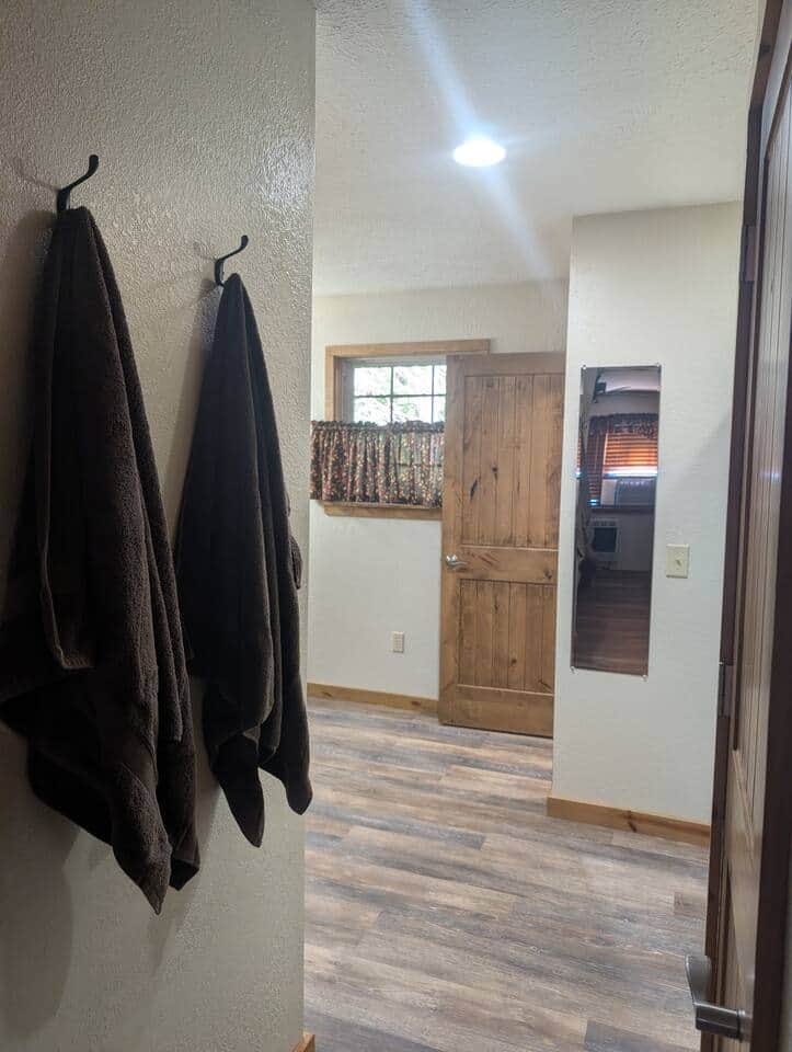 Part of the bathroom with tub/shower combo. 