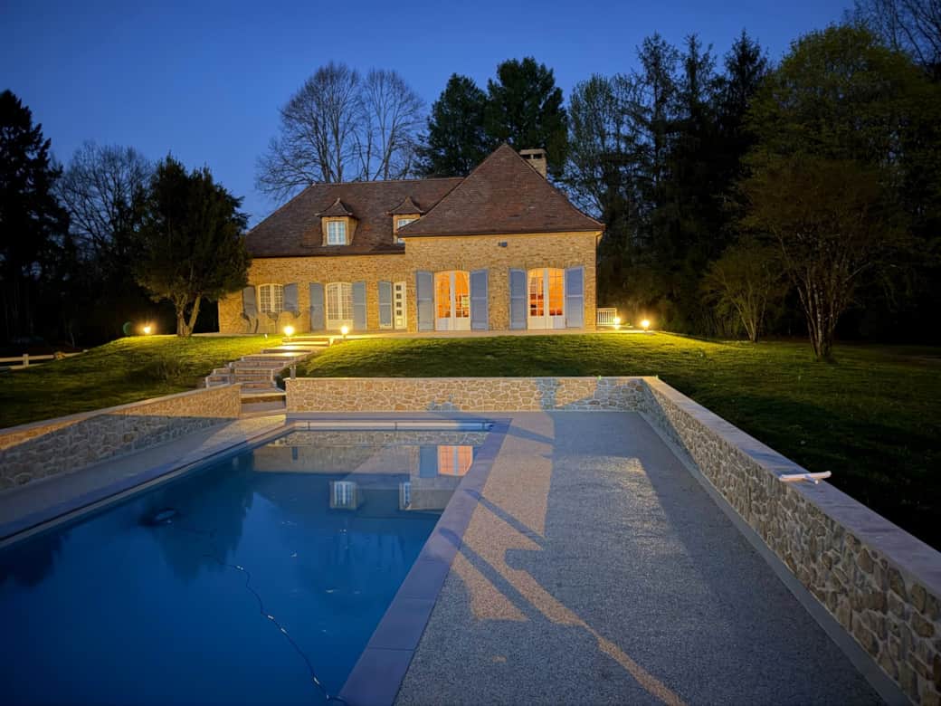 Maison Sérénité glowing in the Dordogne evening light