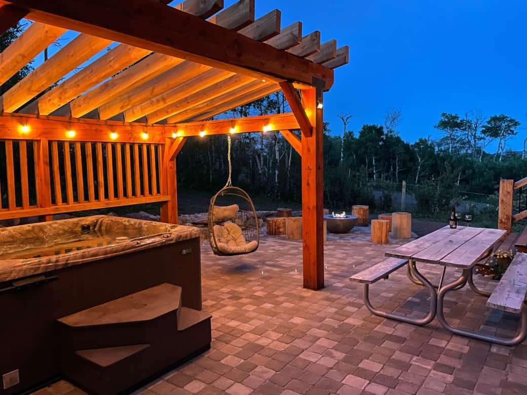 Captivating outdoor patio with natural gas fire table, outdoor dining, BBQ, and mountain views Captivating outdoor patio with natural gas fire table, outdoor dining, BBQ, and mountain views