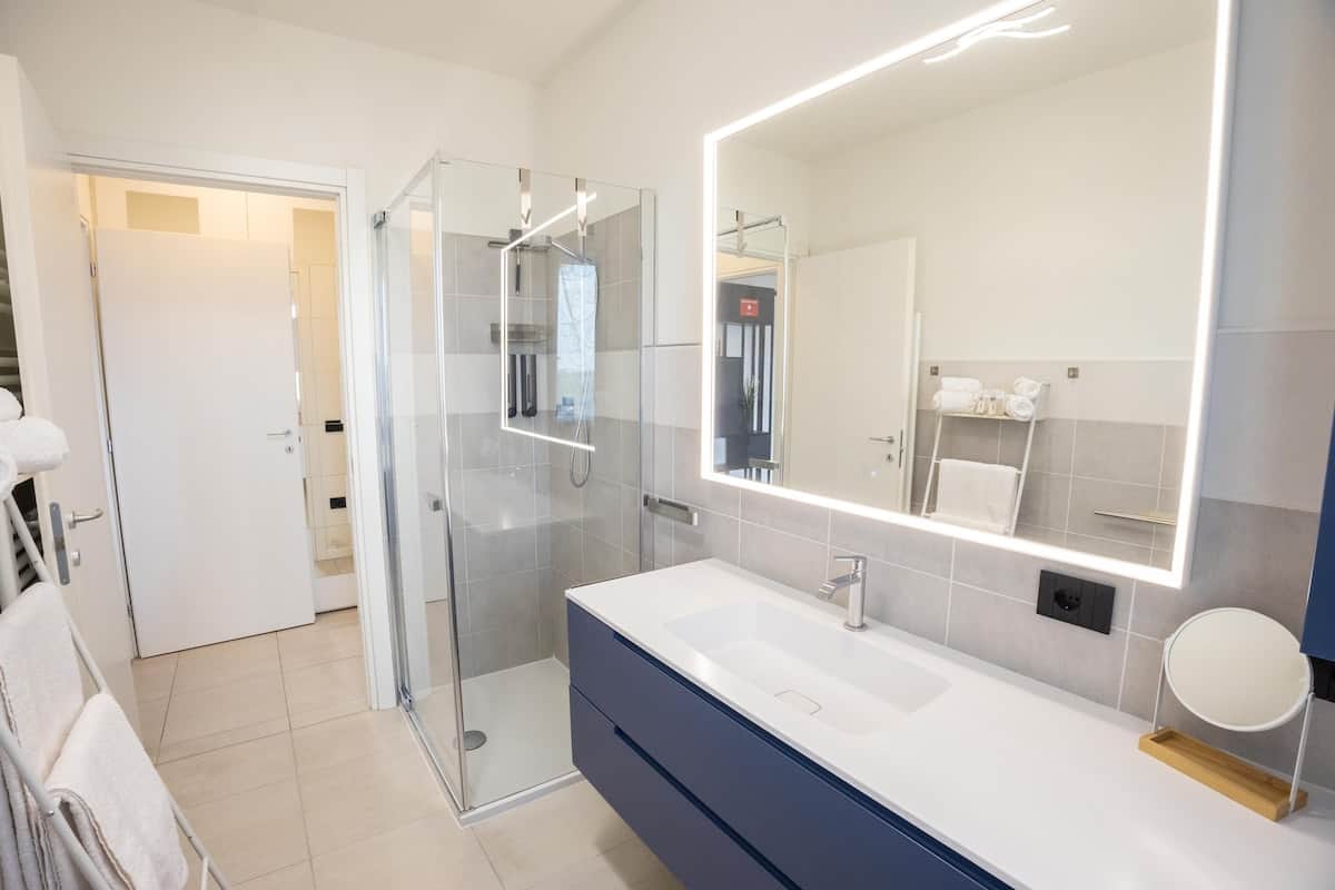 Modern bathroom with a spacious shower and practical vanity area
