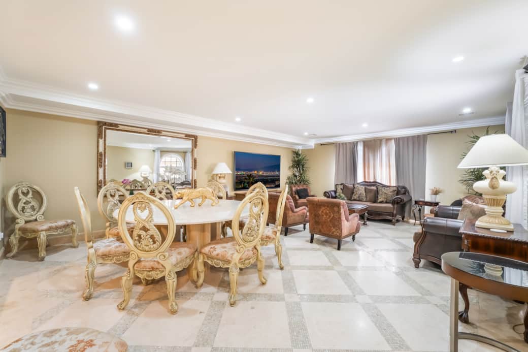 Spacious living room with 95-inch Smart TV