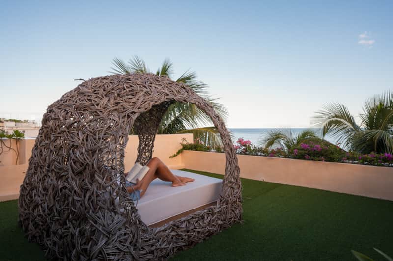 Bird’s nest queen bed on rooftop at Villa TuluMar