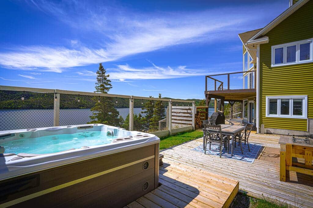 Image showcasing The Cliff House-Luxury Chalet with Hot Tub / View - Cabin in Placentia
