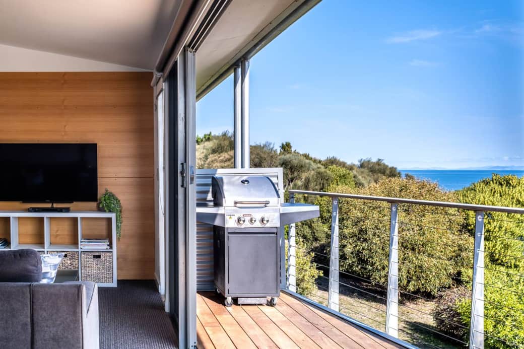 Expansive deck with stunning ocean sunsets
