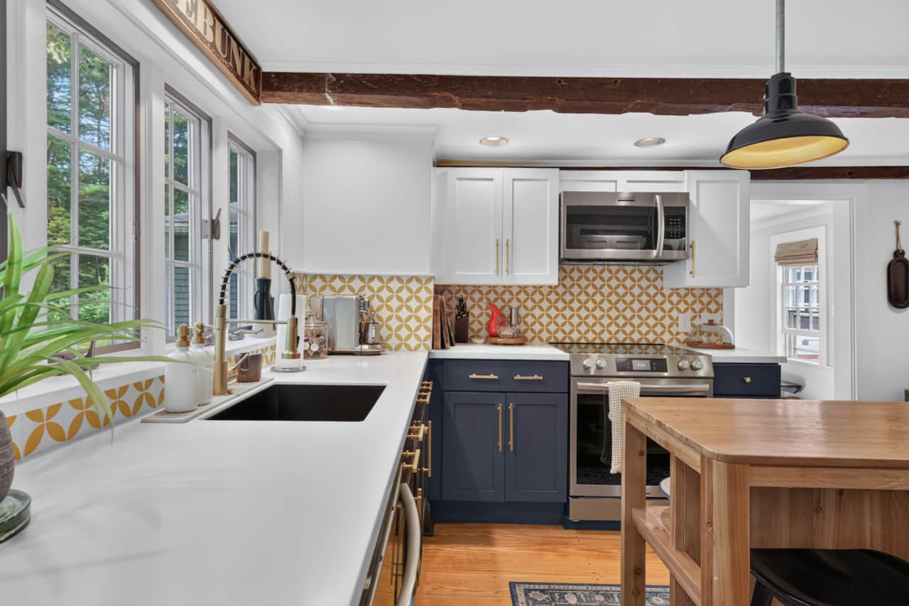 Upon entering the home, you are welcomed to the newly renovated kitchen.
