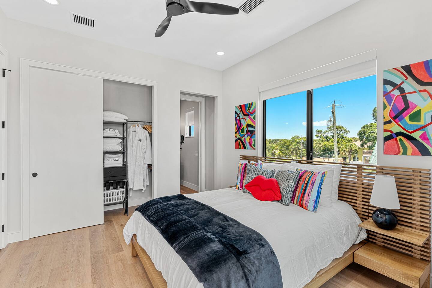 Sleep in comfort with vibrant decor and natural light filling the room, in bedroom 5.
