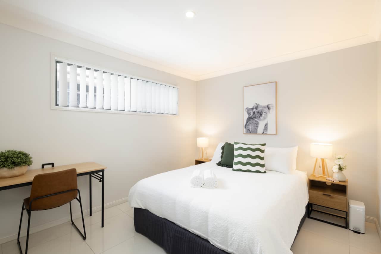 Bedroom 1: Peaceful bedroom with cozy design and ample storage