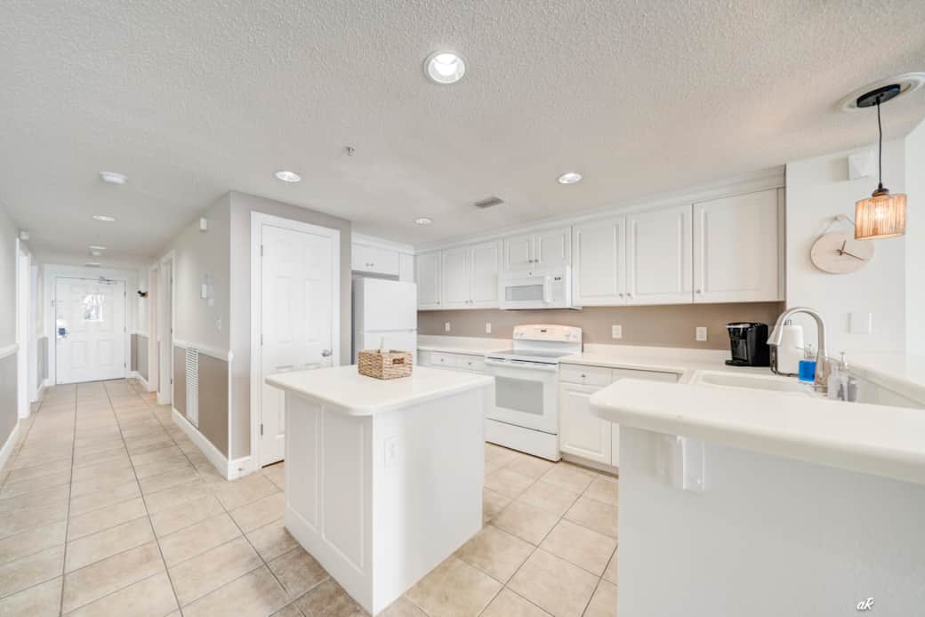 Panama city beach airbnb condo full kitchen white cabinets Panama city beach airbnb condo full kitchen white cabinets