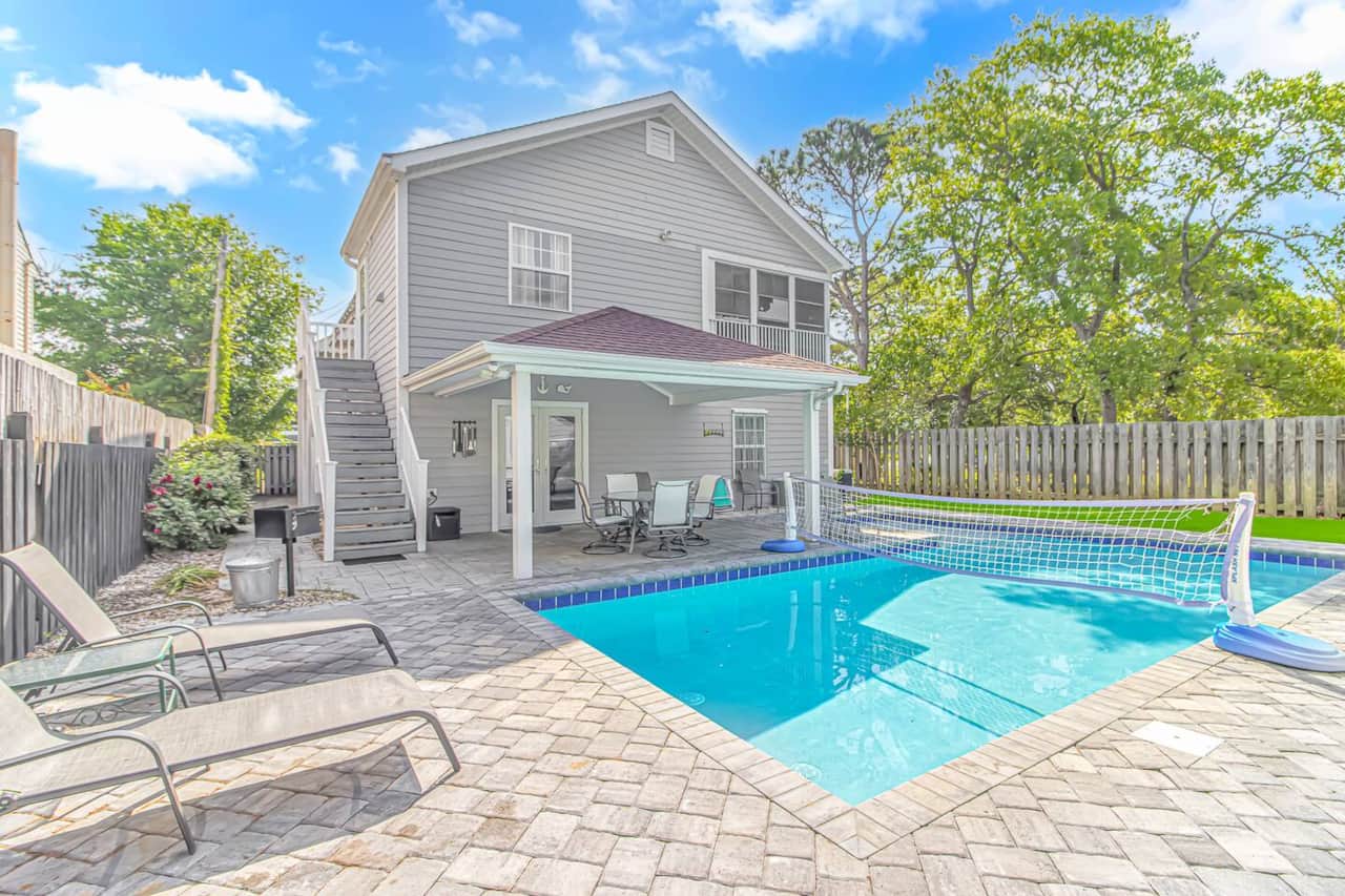 Enjoy pool days, outdoor dining & lounging in your private backyard oasis