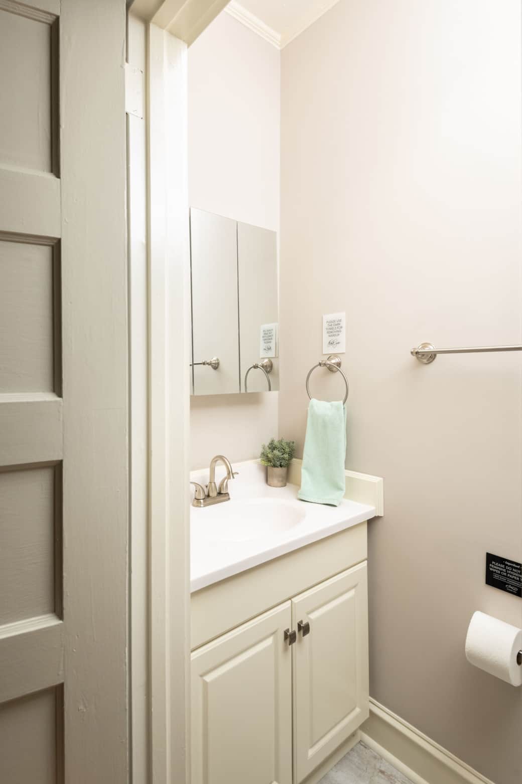 1/2 bath featuring a private entrance from the master bedroom.