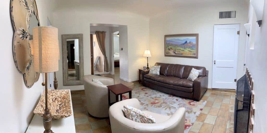 A newly renovated den with all new furnishings.