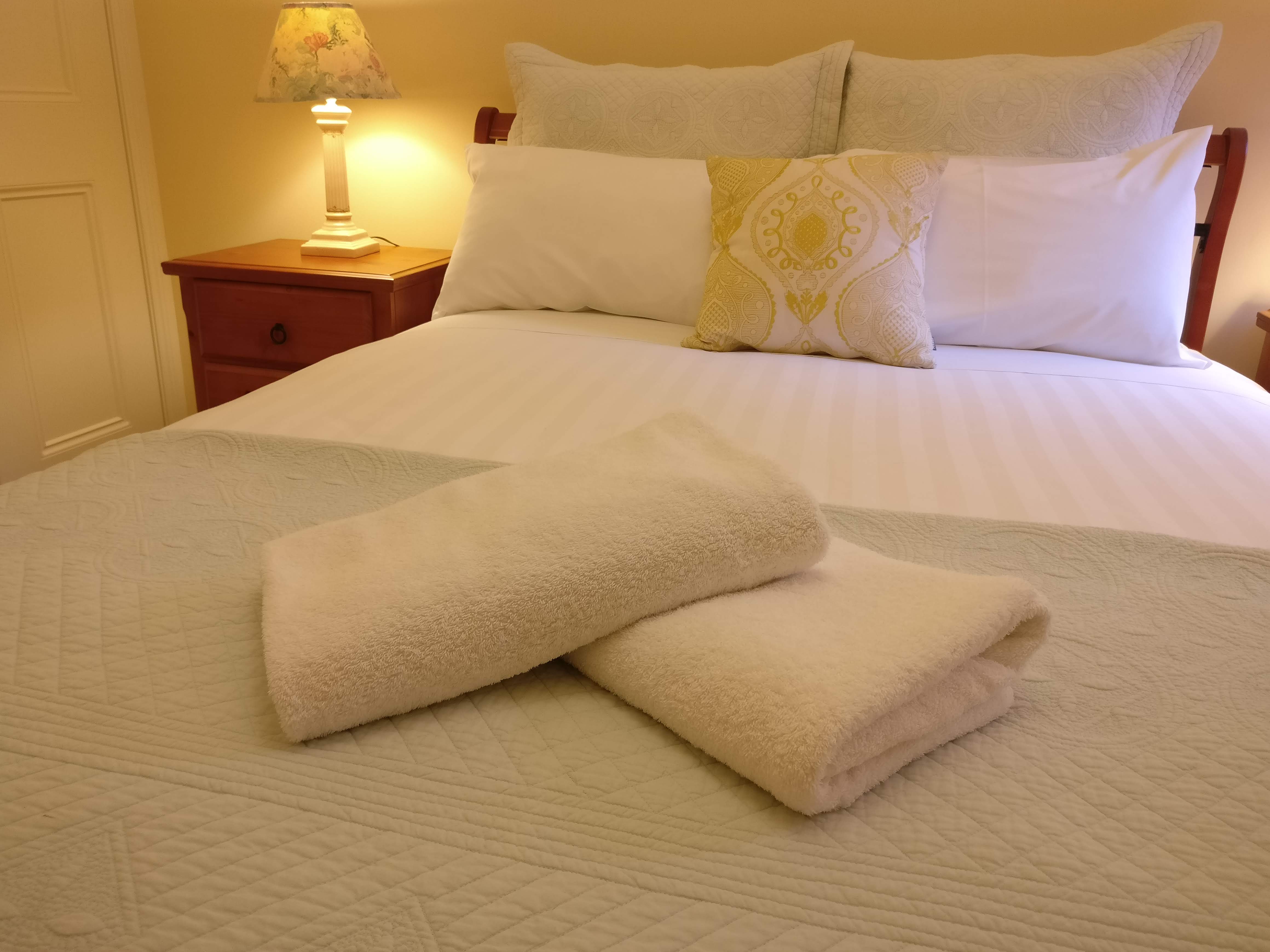 Luxurious bedding with beautiful towels and linen provided 