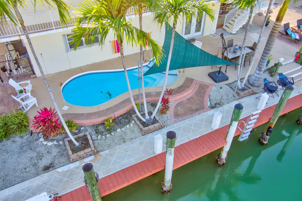Swim in the pool, tie up your boat or fish from the dock