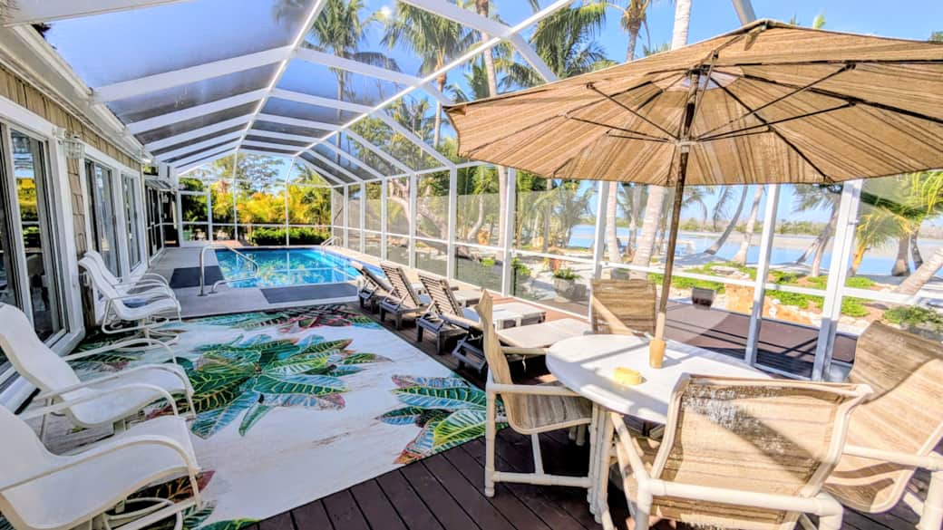 Large screen enclosed lanai and heated pool Large screen enclosed lanai and heated pool