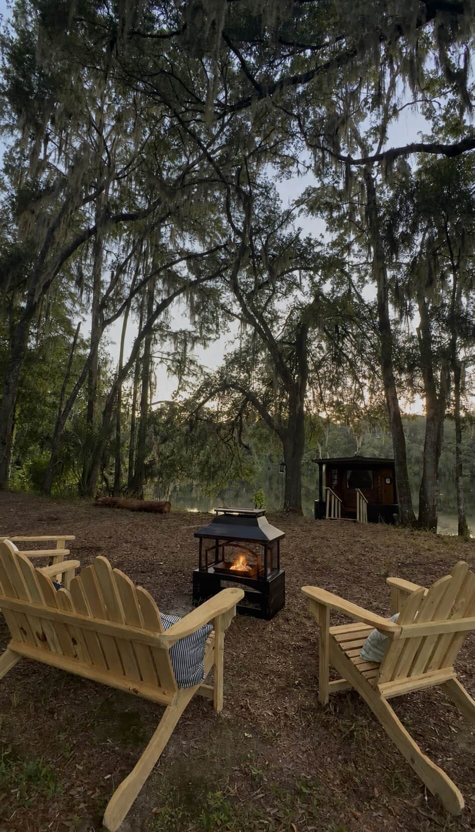 Camp with cabin boat & private cove in background   