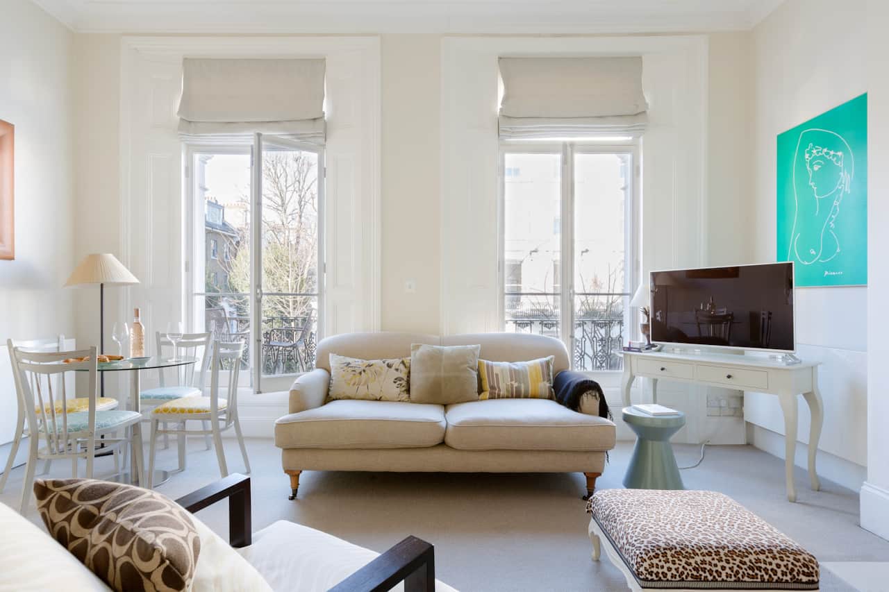 Bright living room with balcony doors, Chelsea apartment