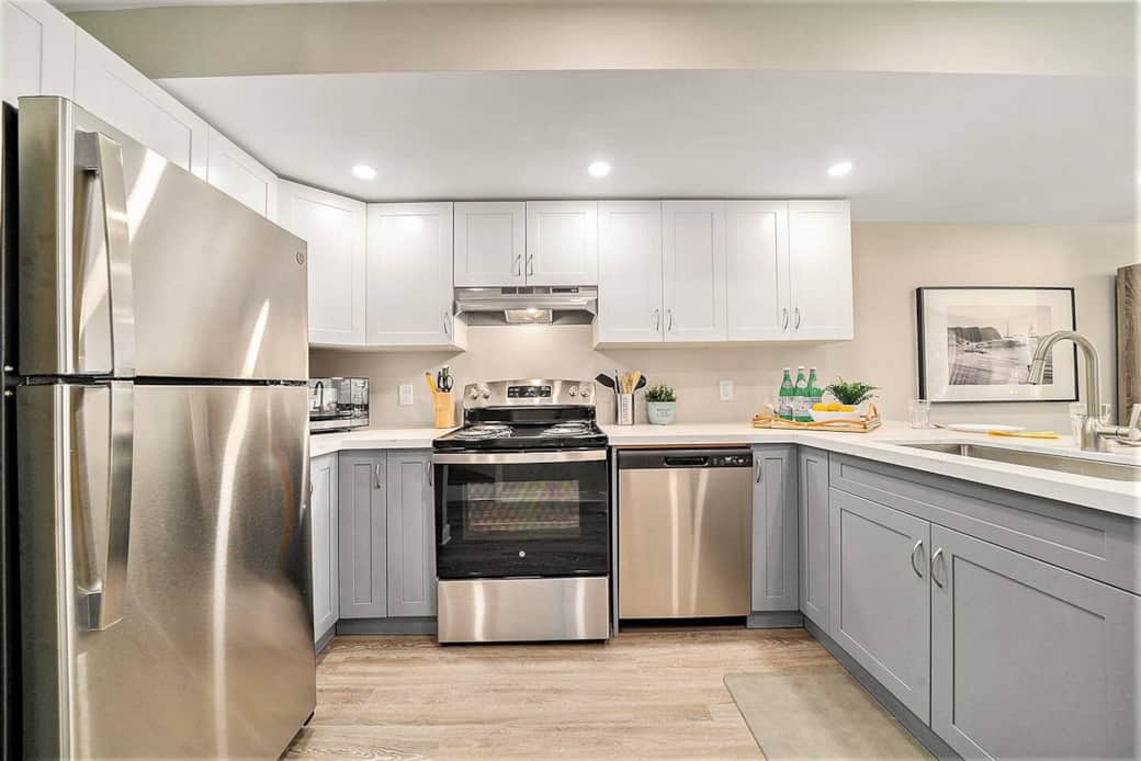 This fully stocked kitchen features sleek stainless steel appliances & granite countertops. This fully stocked kitchen features sleek stainless steel appliances & granite countertops.