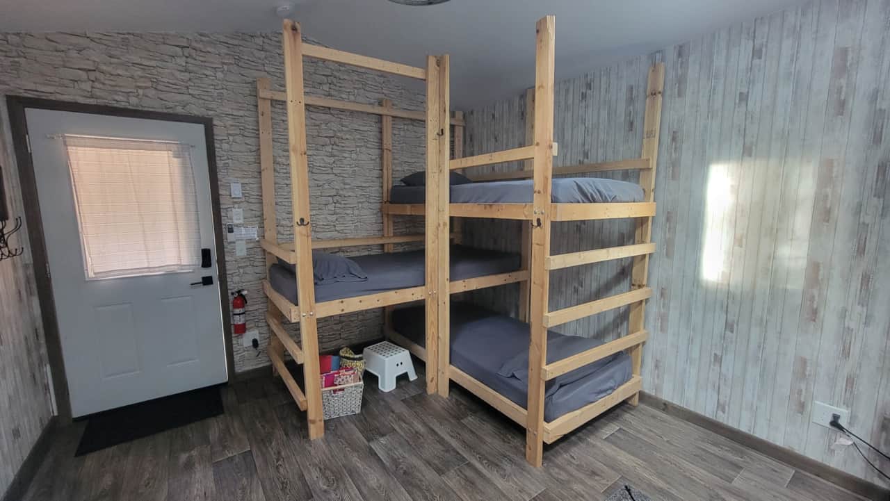 3 twin XL bunks, linens included.