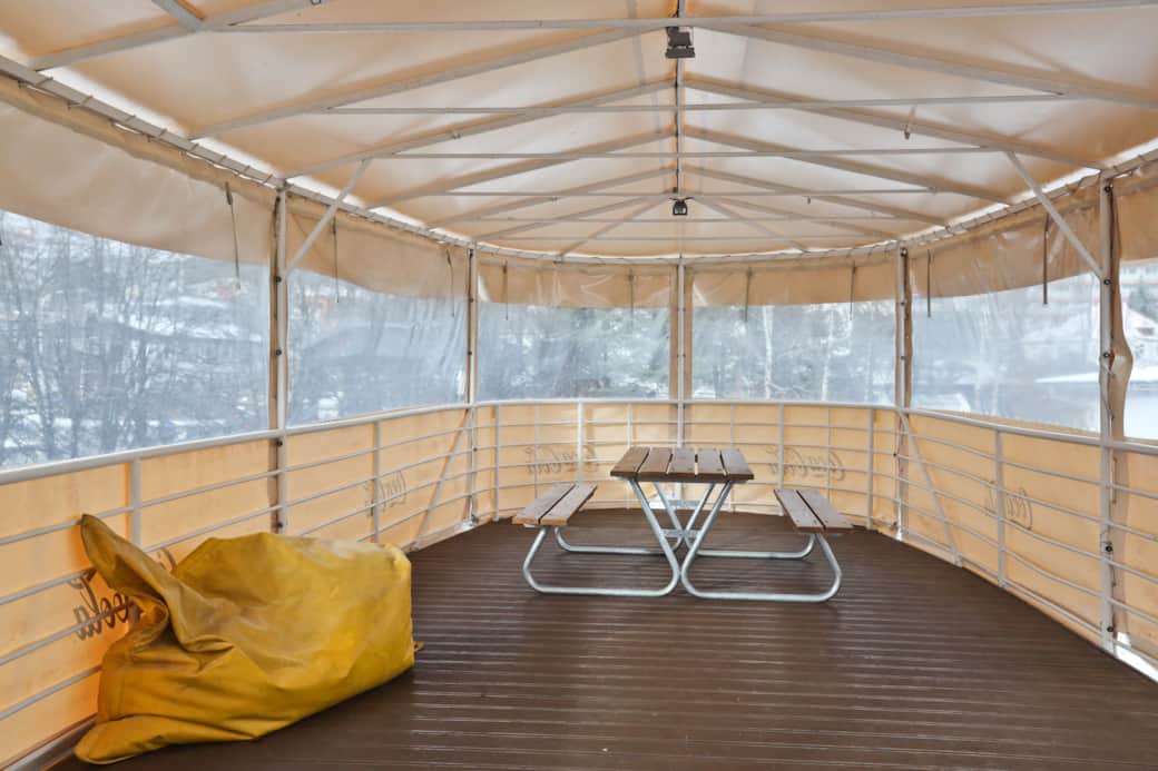shared covered terrace with picnic table and activities - Cabin 1958