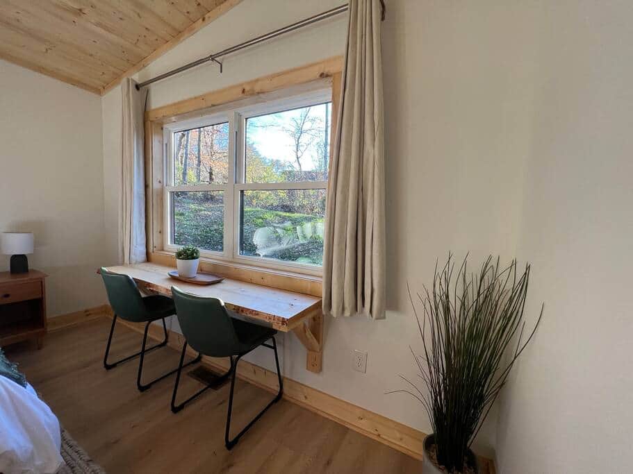Custom built live-edge desk space large enough to accommodate two people