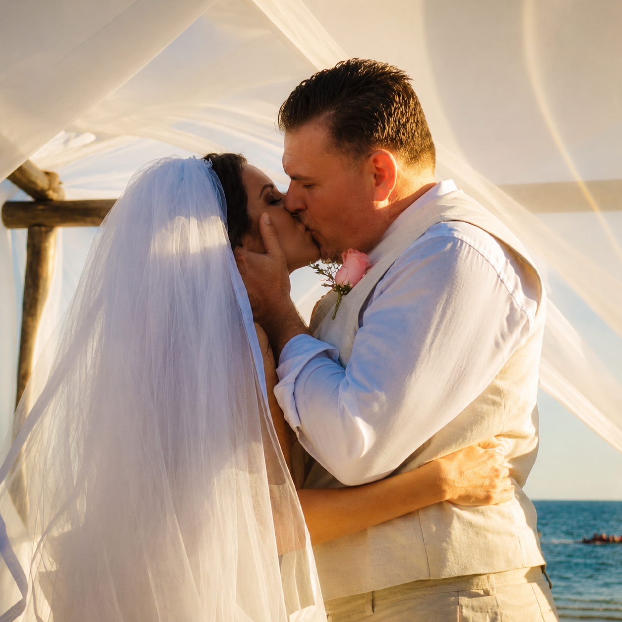 First kiss at Villa Dos Sirenas wedding ceremony