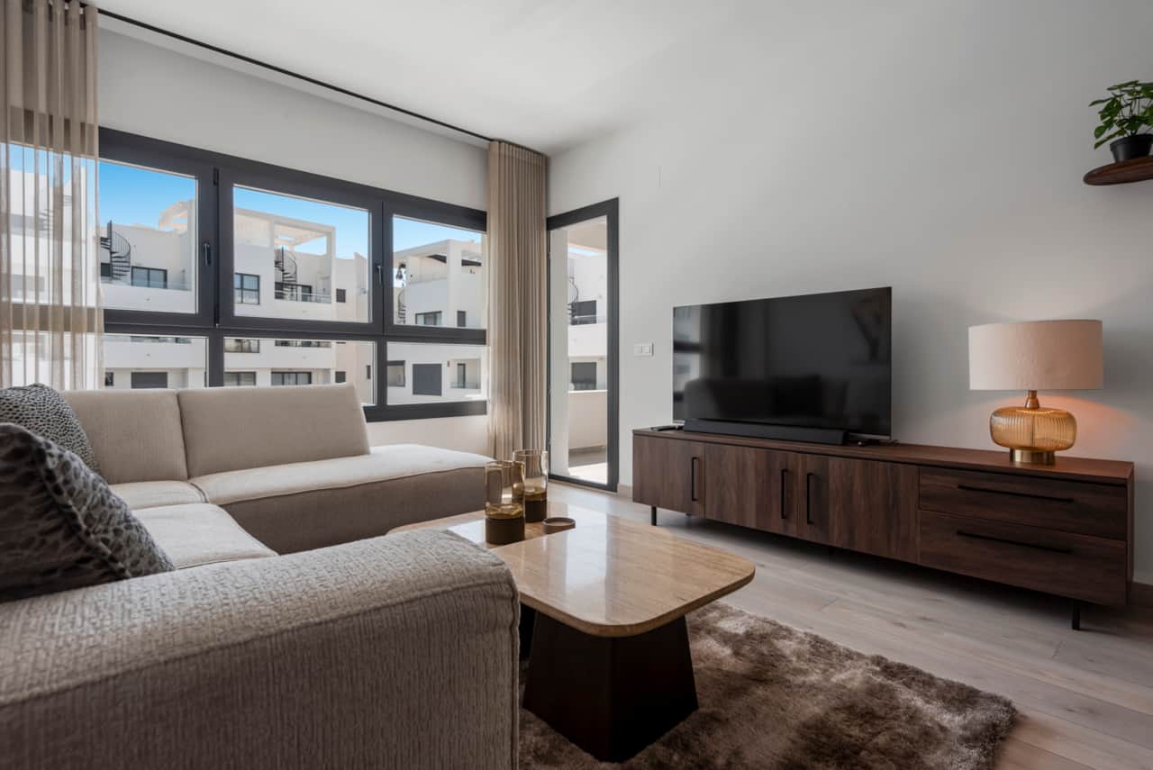 Spacious living room with smart tv and soundbar 