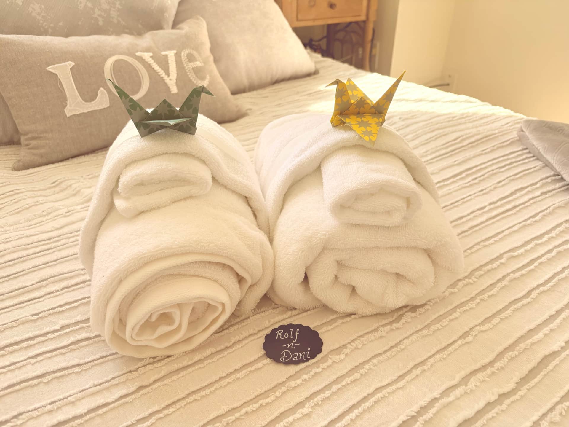 Clean, hotel-quality bathroom with fresh towels staged in a luxury Galveston short-term rental