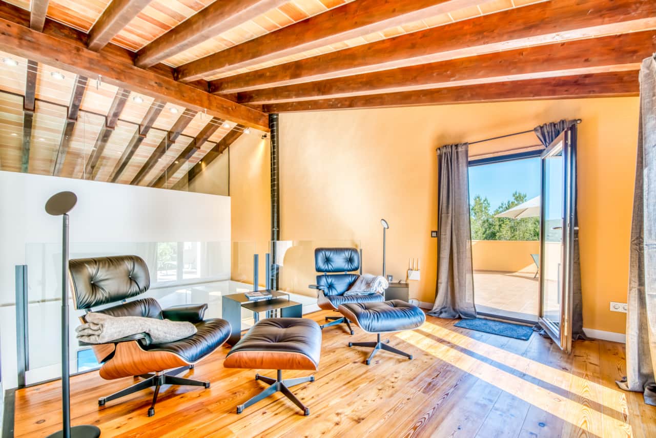 Living area with exposed beam ceiling