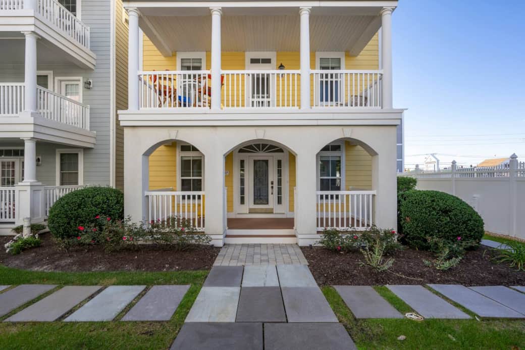 Front entryway showing 2 balconies. 