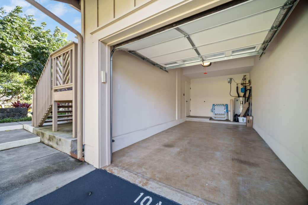 Enclosed private garage with room for parking, golf clubs, and beach gear