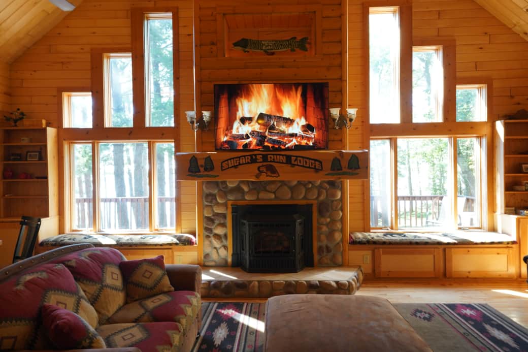 Roku TV and windows overlooking the lake. 