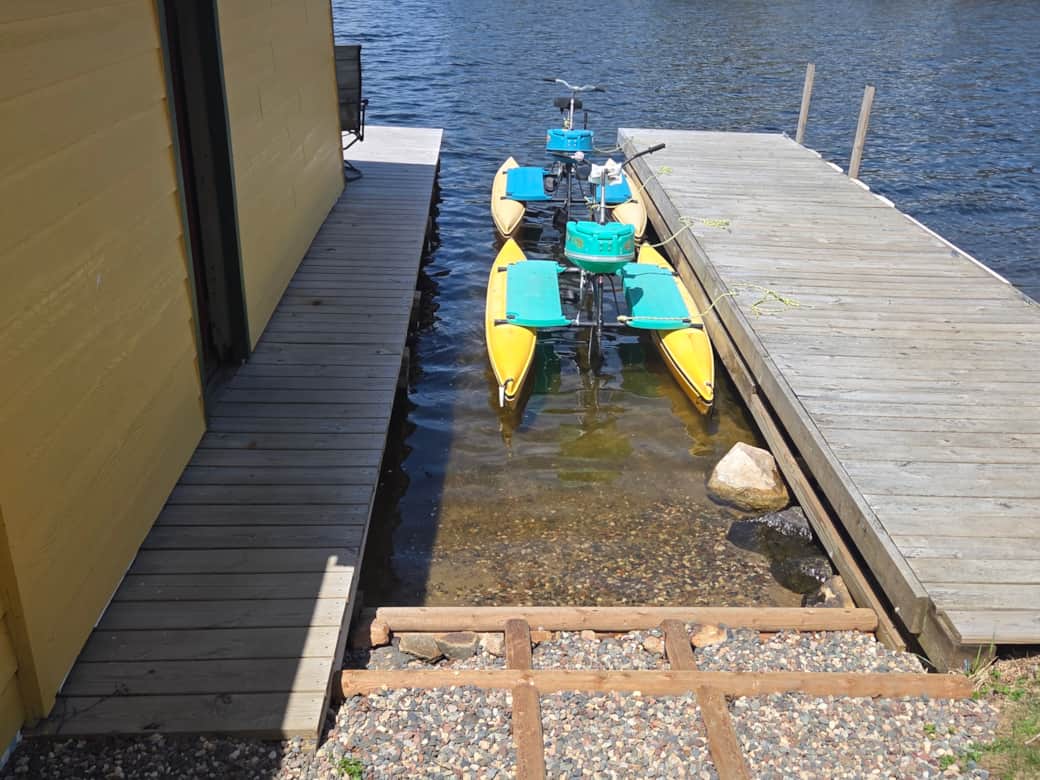 Enjoy swimming at the sandy beach between the docks or riding the water bikes
