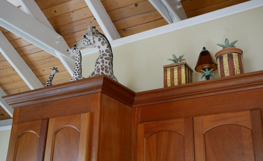 Decorations above cabinets.