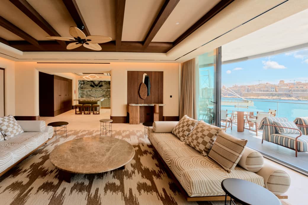 Modern open-plan living with warm tones and natural light.