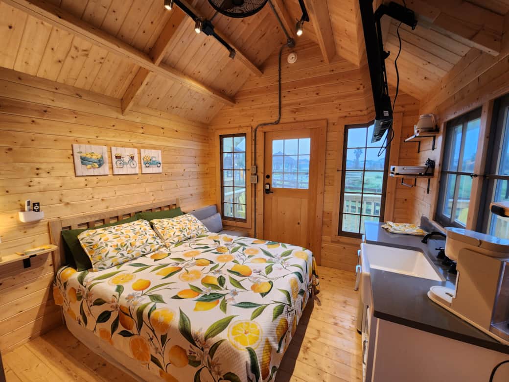 All BOLI Bunkies boast a queen size bed, single trundle and fold out chair to sleep a max of 4!