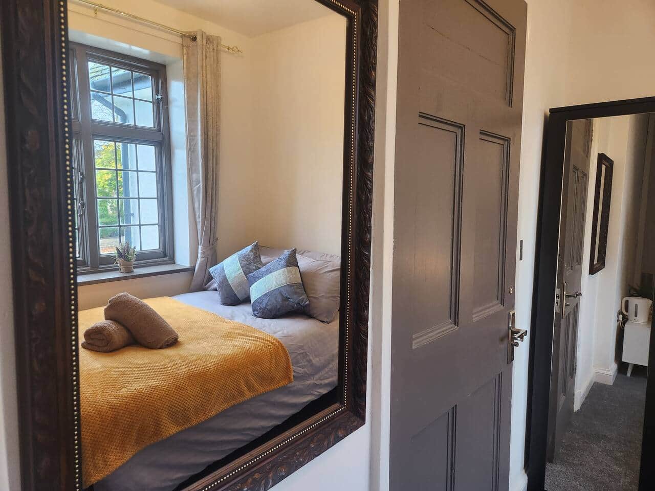 Comfortable bedroom at 239 Seymour Grove accommodation Manchester