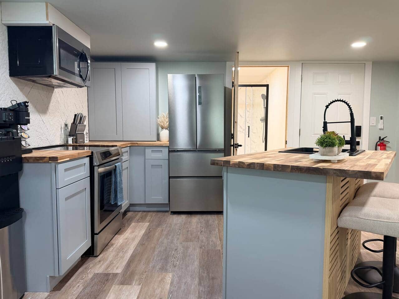 Kitchen with stainless steel appliances.