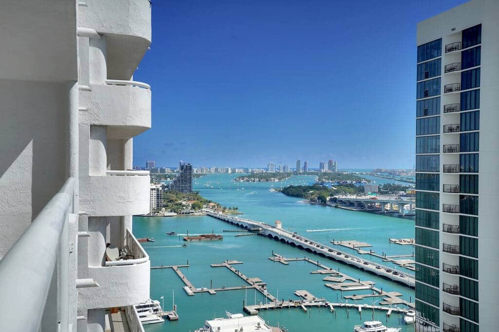 Private balcony with water views of Biscayne Bay, Venetian Marina, Miami Skyline  