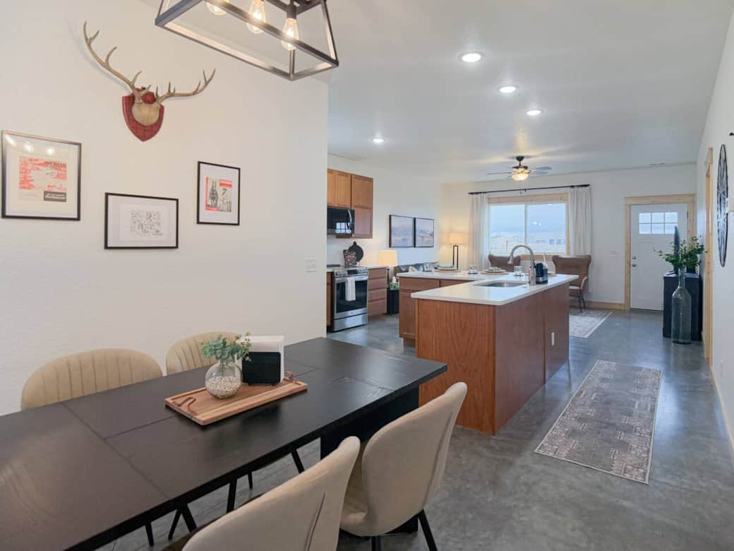 The heart of the home. This spacious dining area bridges the kitchen and living space, ideal for family breakfasts or evening board games.