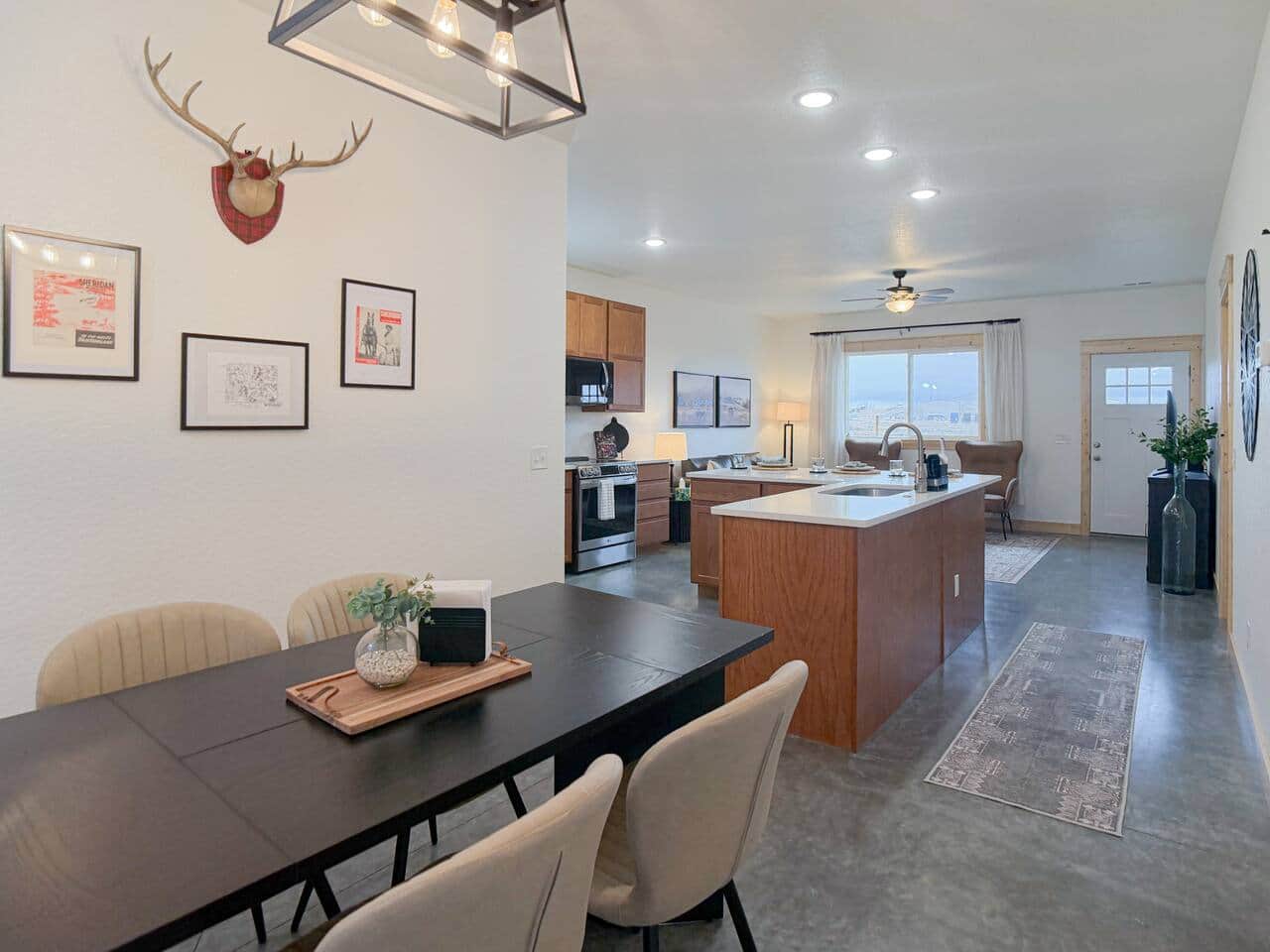 The heart of the home. This spacious dining area bridges the kitchen and living space, ideal for family breakfasts or evening board games.