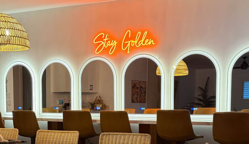 The beauty bar is perfect for groups getting ready together or relaxing with a glass of wine, conveniently located next to a separate wine fridge.