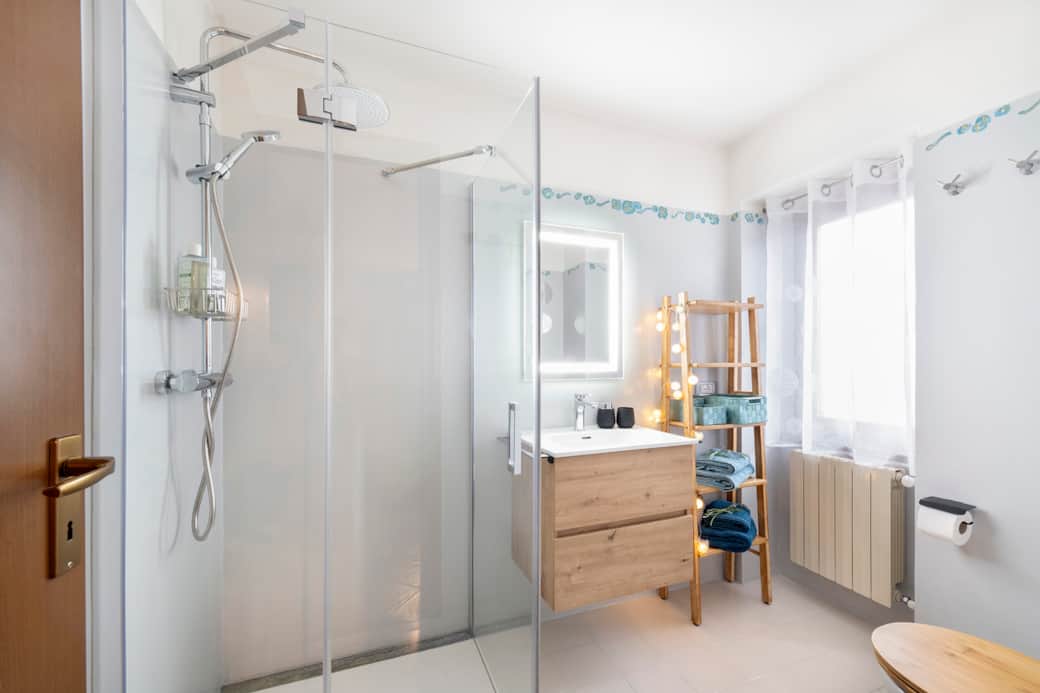 A luminous, well-appointed bathroom, crafted with your comfort in mind.