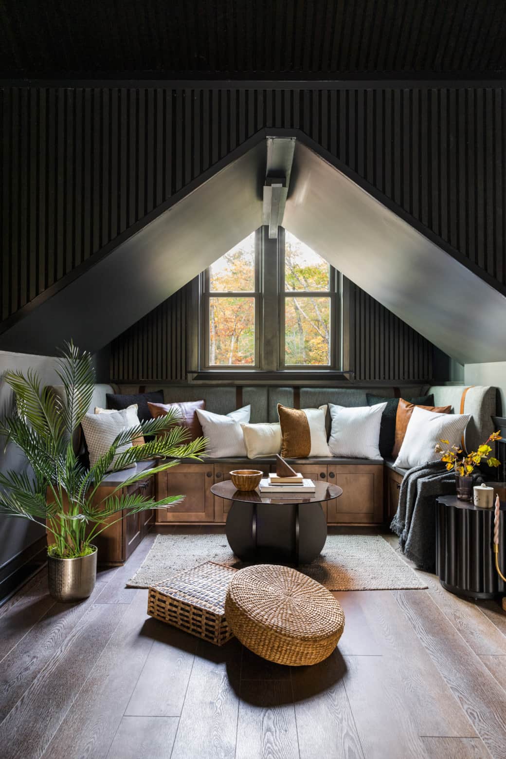 Cozy lounging nook with rich leather accents and inviting textures