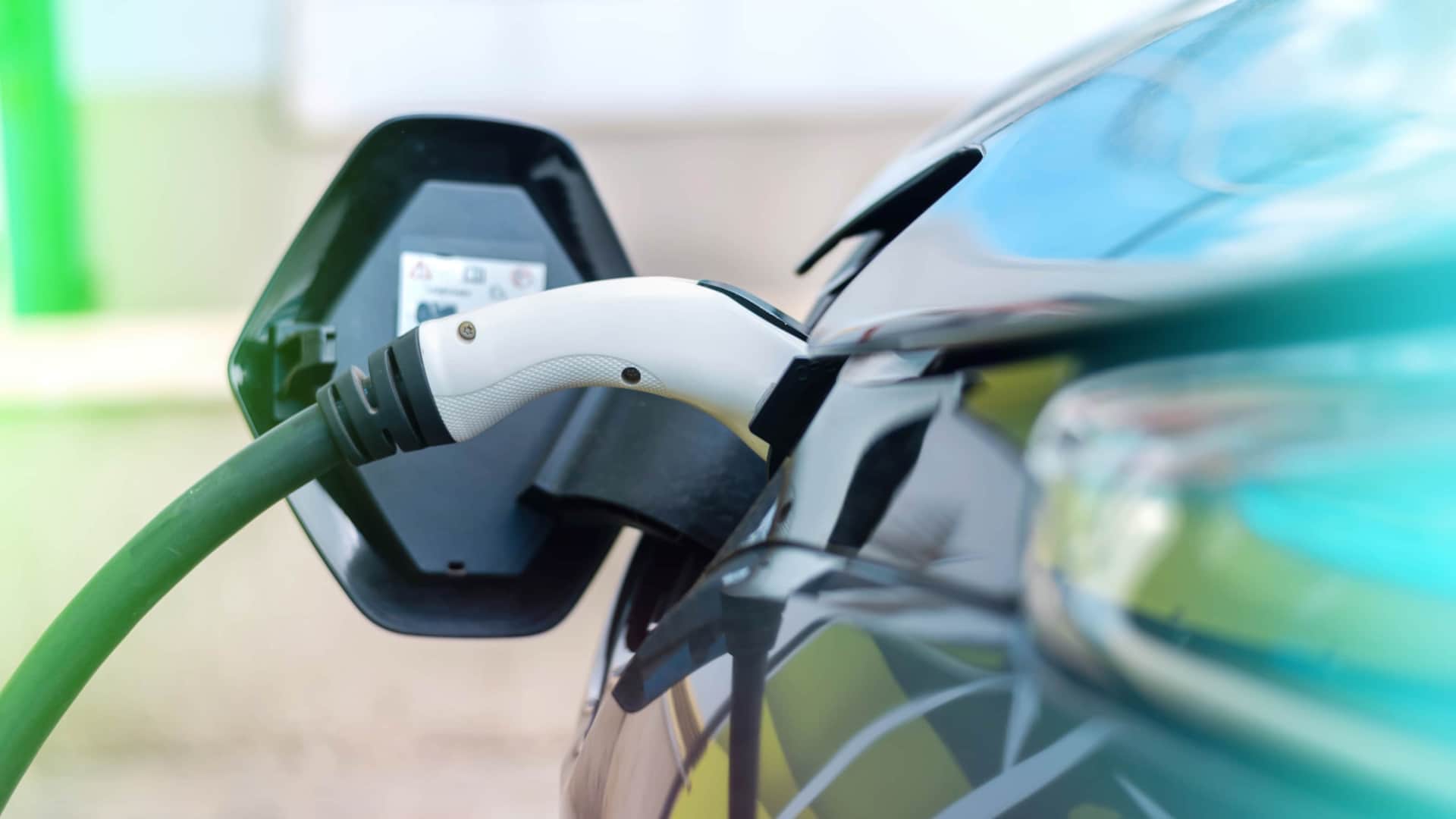 Car with EV charger Plugged in