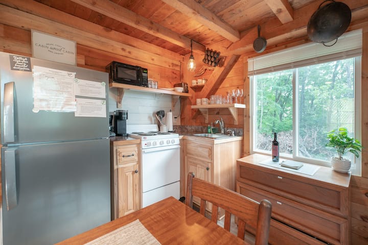 Cook with a view. Our well-equipped kitchen ensures you enjoy meals, surrounded by mountain beauty.