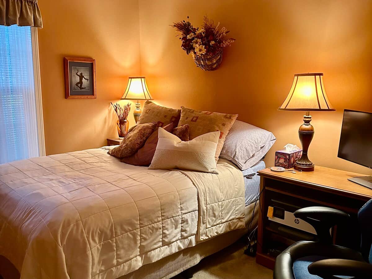 Bedroom two has a queen-sized bed. There are blankets, pillows and extra sheets in the closet.